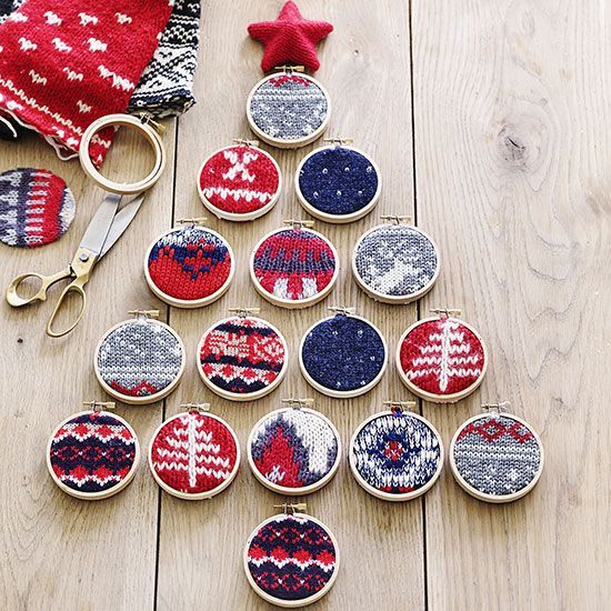 Make a ready-for-the-wall tree design with 16 small embroidery hoops (we used 3-inch-wide hoops) and interesting cuts from a Christmas sweater. Simply place the sweaters inside the hoops, fasten, and trim excess. Lay out in a tree pattern and use removeable adhesive to attach to your wall./